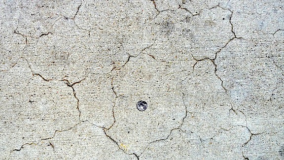 Repairing cracks in concrete