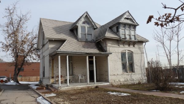 This old home's roof is made of asbestos shingles.